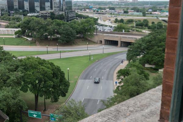 The window of the book depository overlooking Dealey Plaza. It's really
  not as far as you would think.